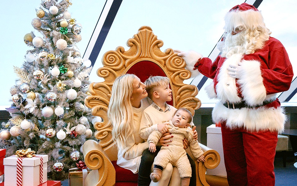 Kids meeting Santa on a Christmas cruise